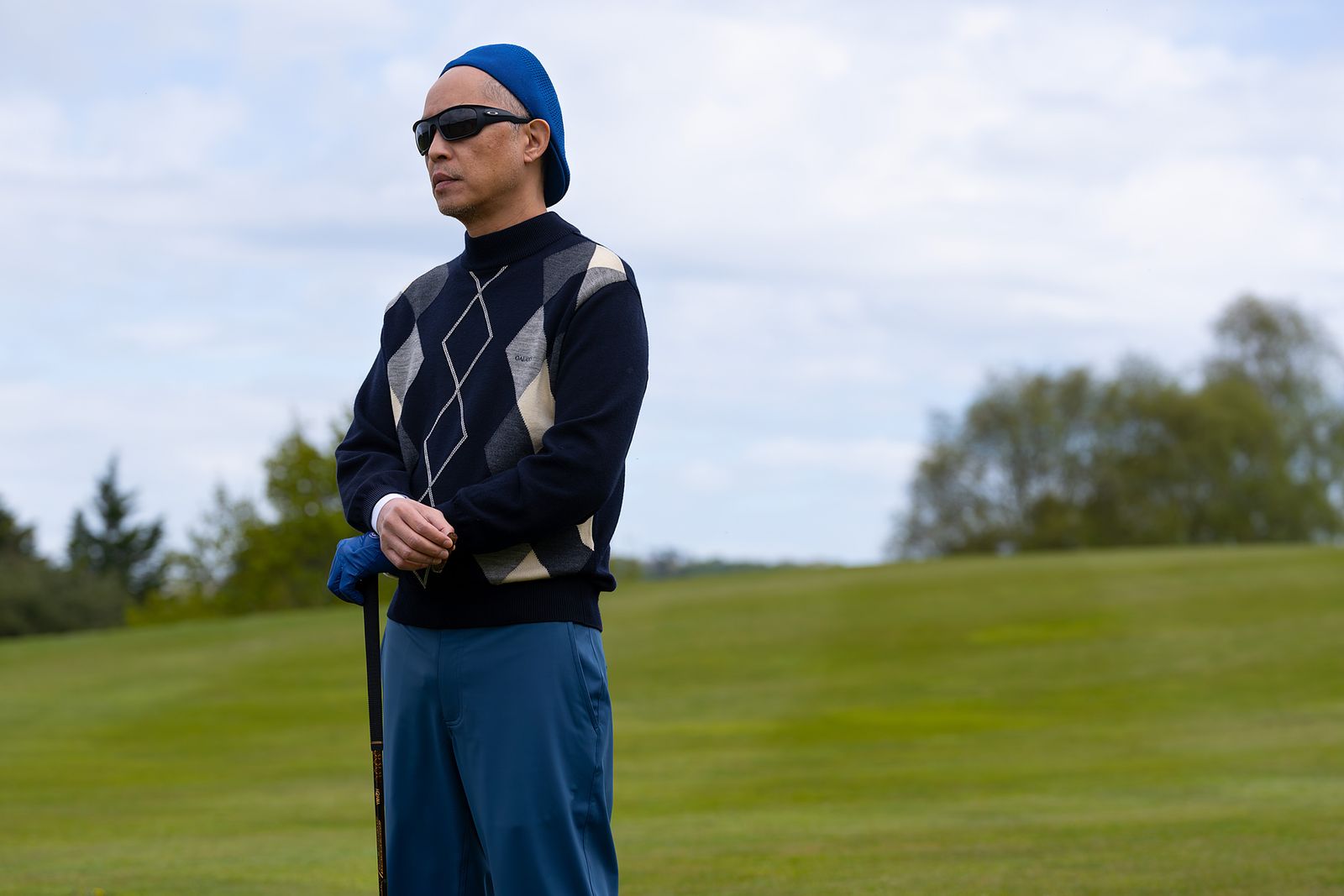 Image may contain Ken Leung Adult Person Field Cap Clothing and Hat