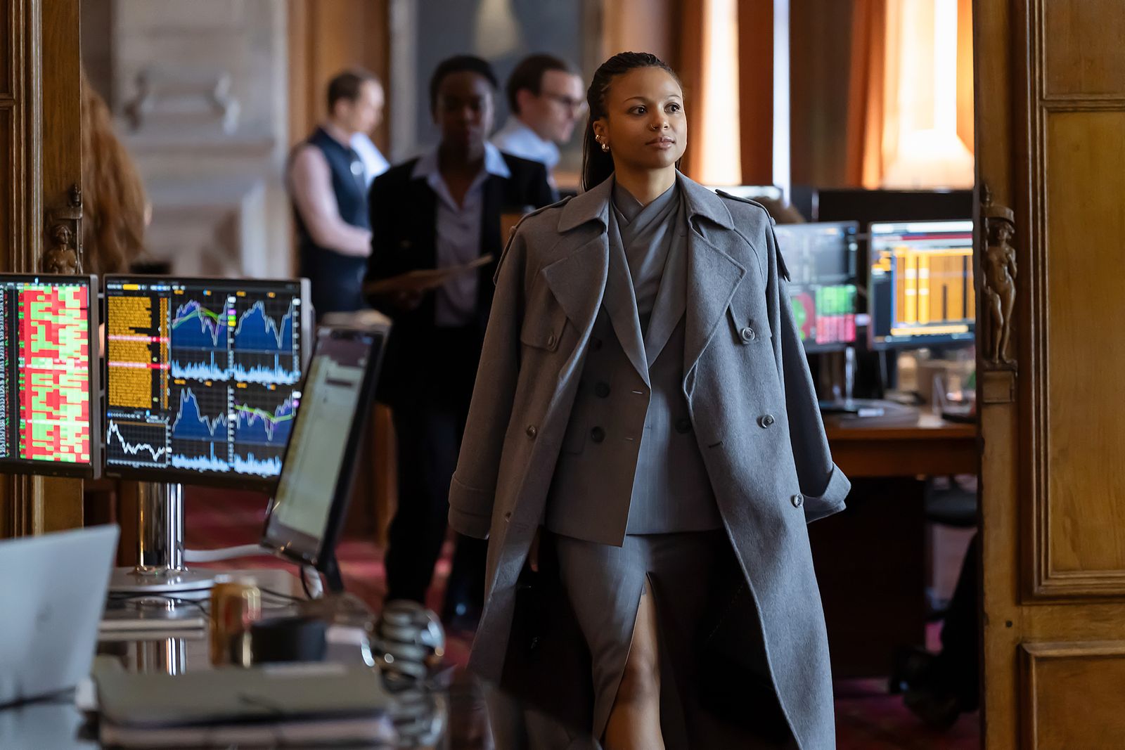 Image may contain Thishiwe Ziqubu Clothing Coat Formal Wear Suit Person Glove and Adult